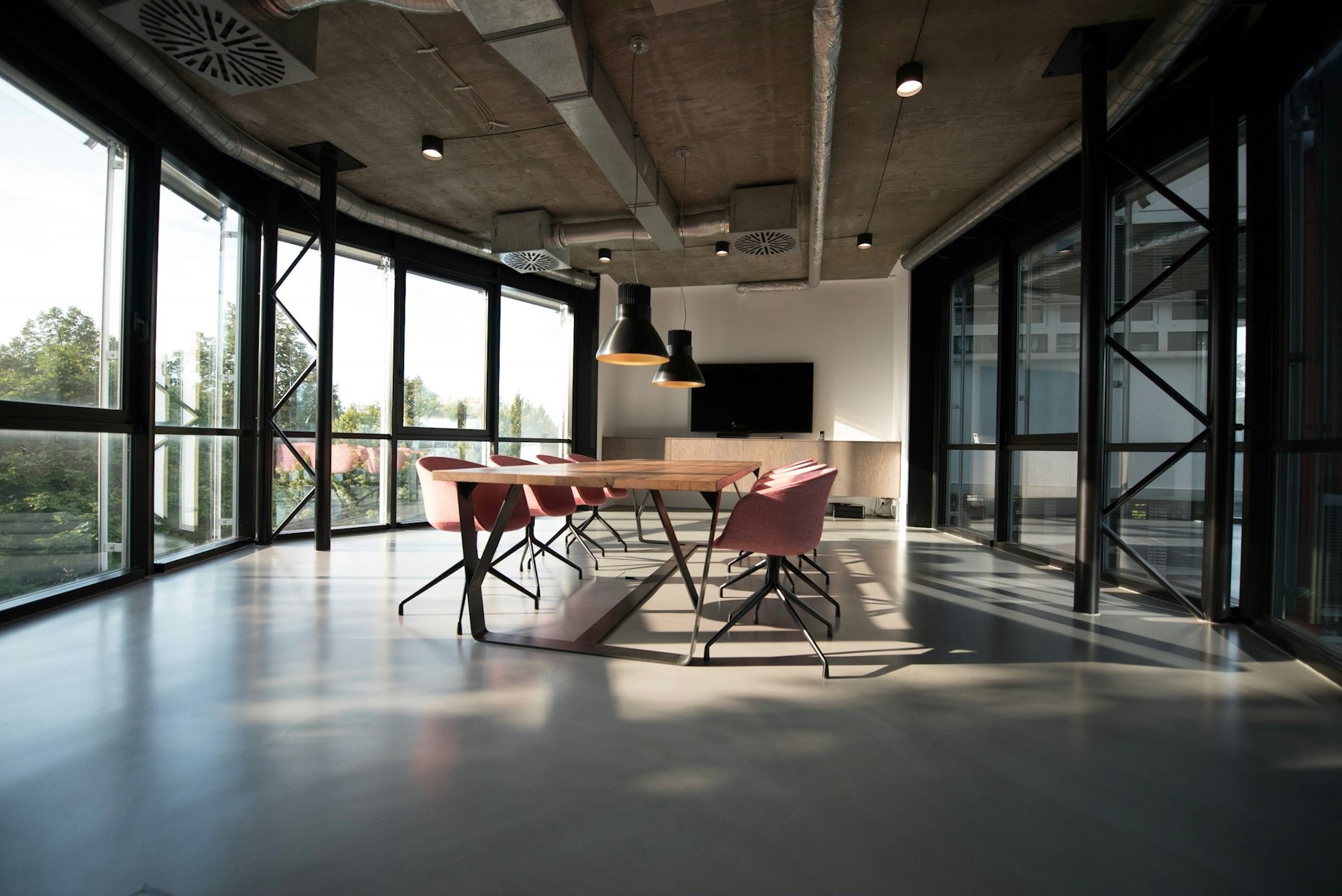 Modern office interior with glass walls.