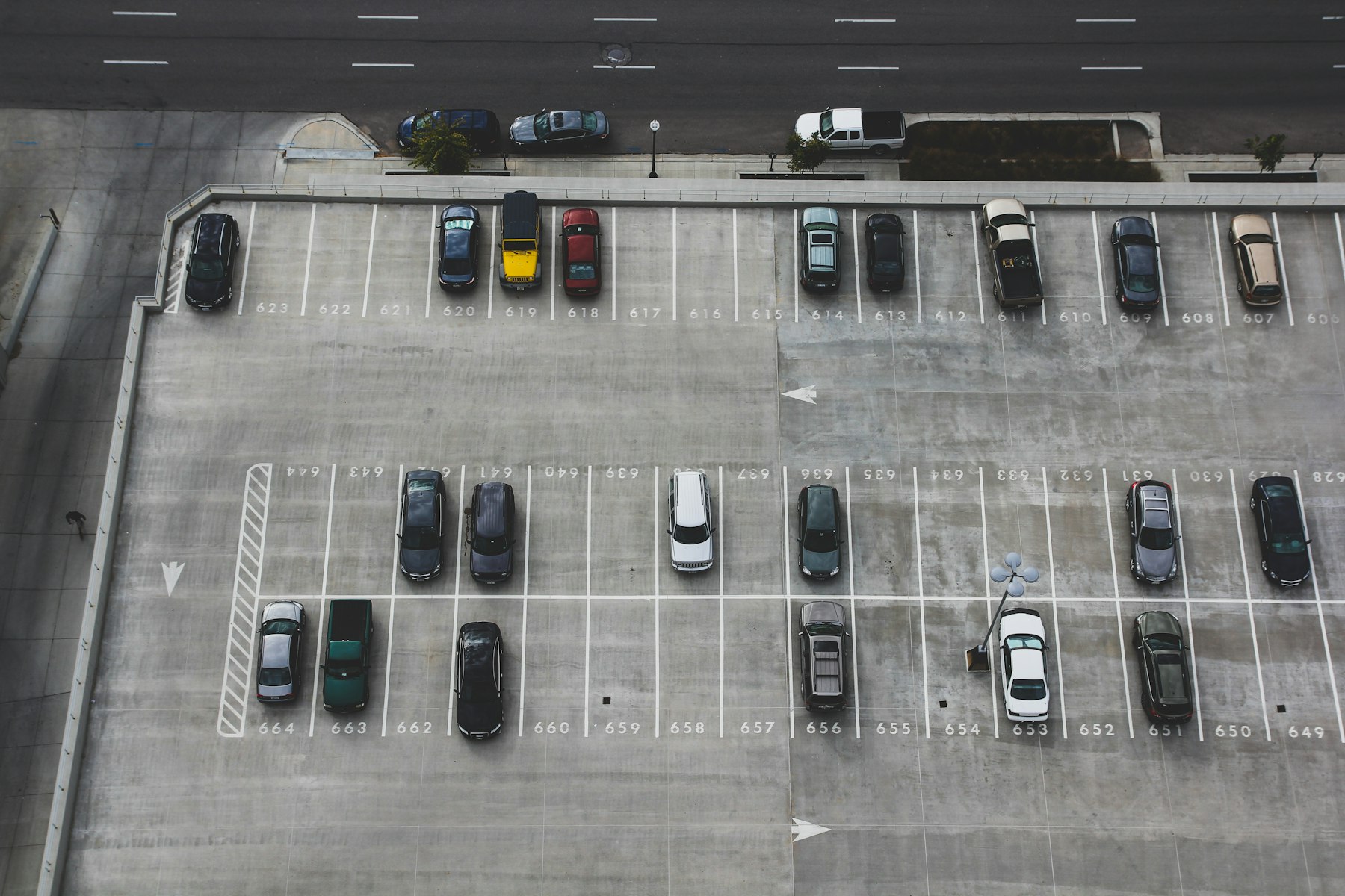 Aerial view of numbered parking stalls.