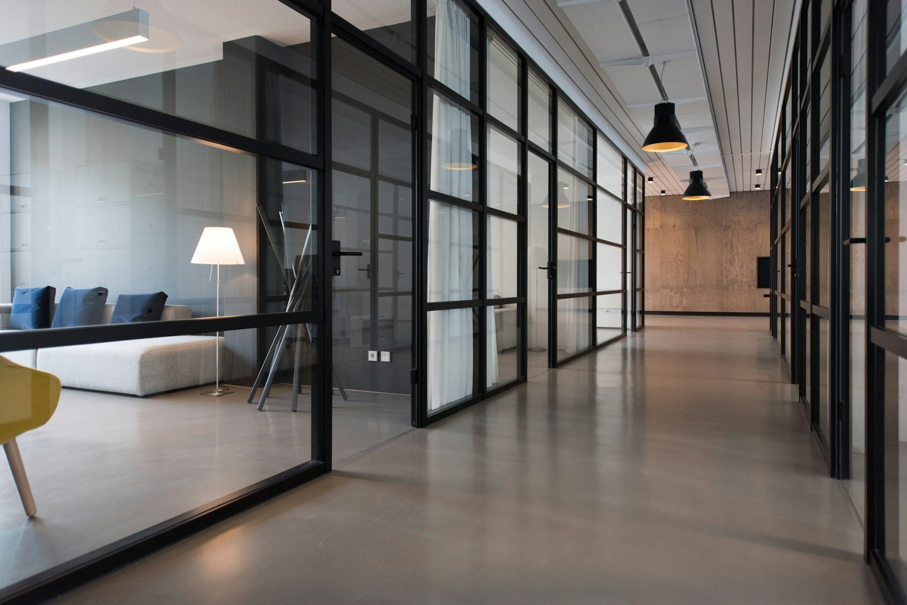 A calm, modern workspace with soft daylight.
